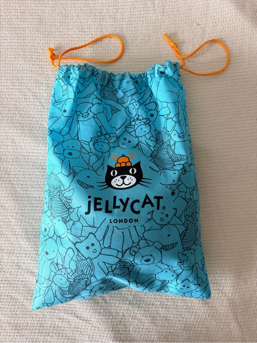 Elephant Jellycat with Turquoise Drawstring Kids Accessory Bag with Orange Cords